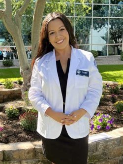 Mandy Welsh in her white coat.