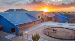 Exterior view of Animal Health Institute during sunset.