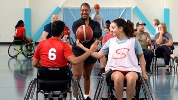 Wheelchair Basketball players in gym.