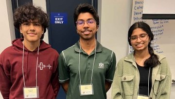 Top three students of Midwestern's Brain Bee standing side by side 