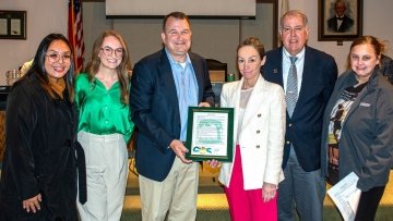 Pharmacy students, faculty receive proclamation from the Downers Grove mayor