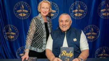 Dr. Goeppinger and Rudy Ruettiger at book signing event.