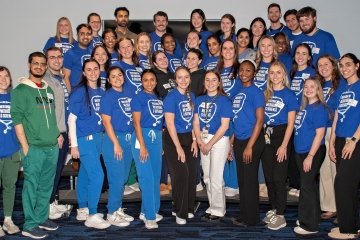 Group of MIMS mentors pose for photo