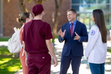 Joshua Baker, O.D., M.S., President and CEO of Midwestern University, speaking candidly with MWU students.