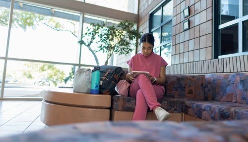 Student studying in lobby area
