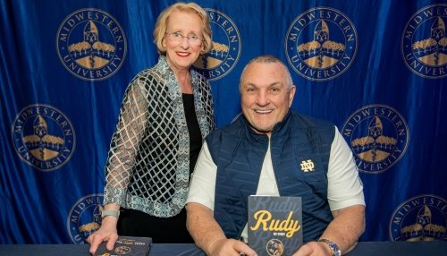 Dr. Goeppinger and Rudy Ruettiger at book signing event.