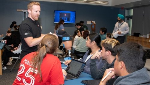 students learning about prosthetics in classroom