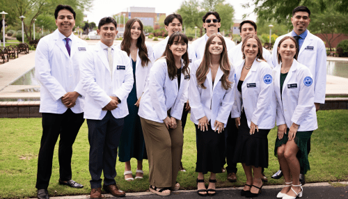 First-year Midwestern University students with their new white coats.