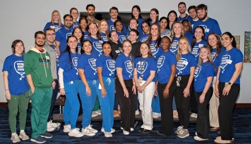 Group of MIMS mentors pose for photo