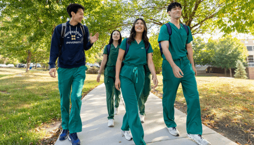 Group of students walking at the MWU Downers Grove campus.