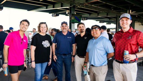 golfers posing for camera