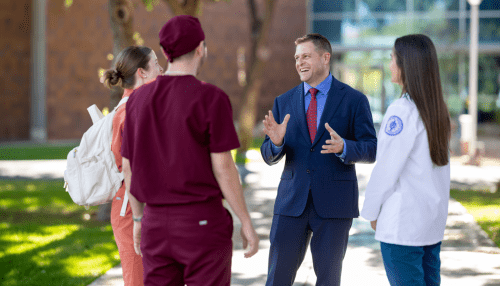 Joshua Baker, O.D., M.S., President and CEO of Midwestern University, speaking candidly with MWU students