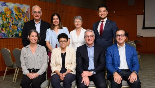 Dr. Brownstein sits with her working group of other leaders in dental education