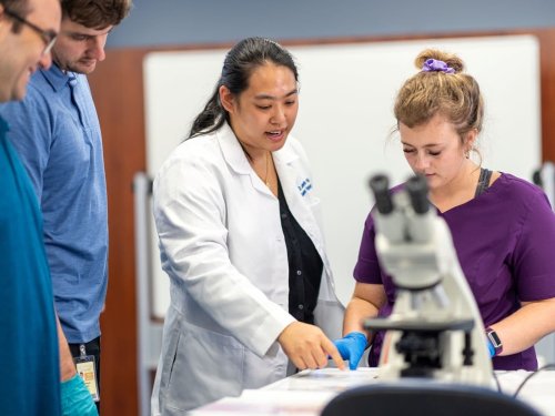 professor teaching in vet lab
