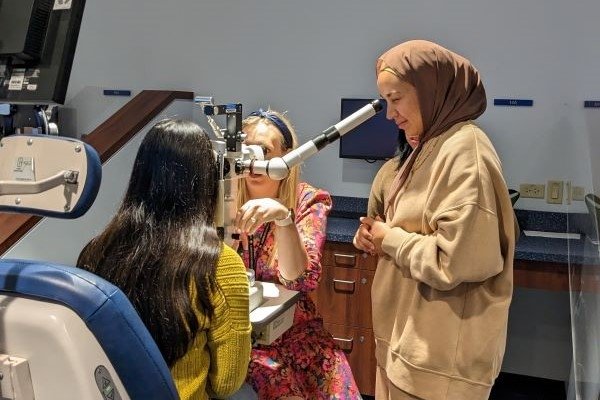 College students participate in the SEE program to learn about optometry.