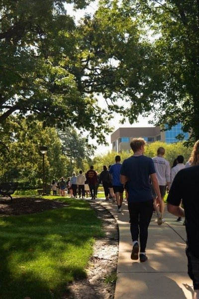 Midwestern University community and guests participate in a suicide prevention walk. 