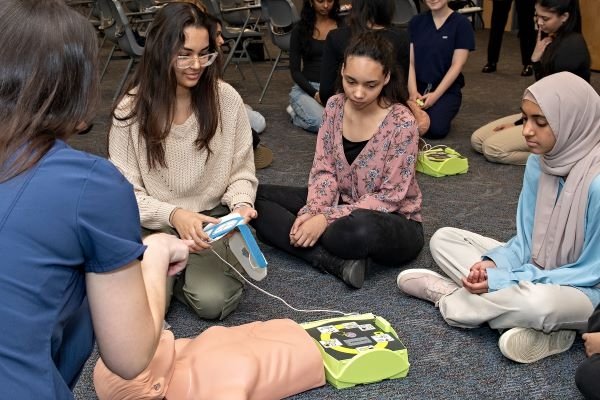 Students participate in simulations with a manikin, which is a part of the experience of the current Midwestern University healthcare students in their coursework. 