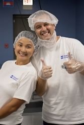 two people posing for camera