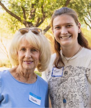 Community member Sharon Sparks and AZCOM student Taryn Elsner smile at the camera 