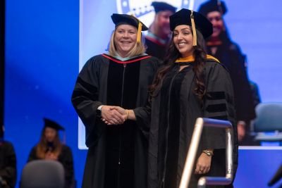 Dr. Radtke congratulate a graduate
